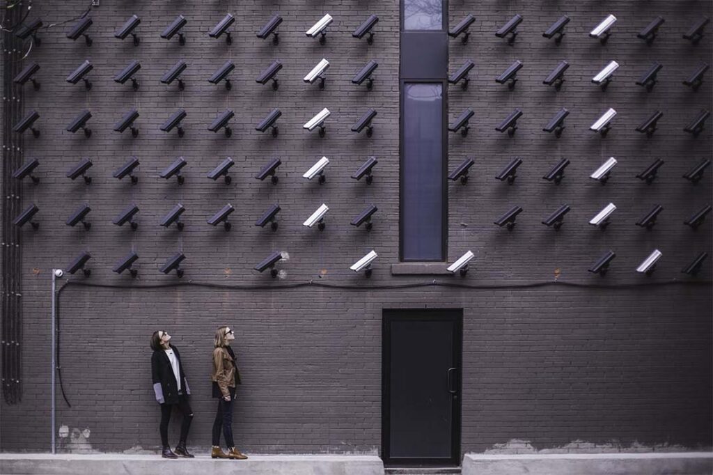 A wall of security cameras
